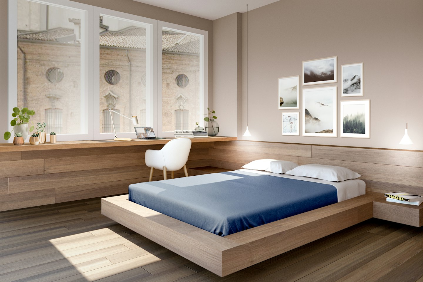 A bedroom with a low bed, wooden furniture, and framed pictures.